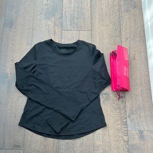 Brand new, in bag, compression Fanka top